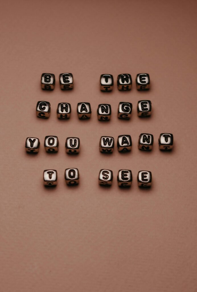 A Close-Up Shot of Silver Letter Beads